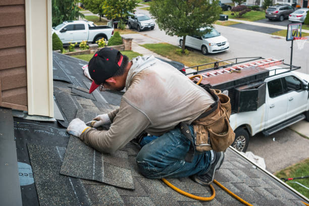 Professional Flat Roof Repair technician working in South Dartmouth, MA